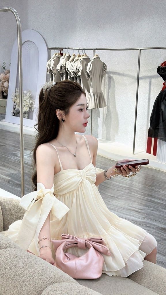 Đầm babydoll kem sữa dáng xoè tay rơi buộc nơ (K67)