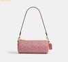  Túi Đeo Vai Coach Barrel Bag In Signature Canvas Melon Pink CDY79 