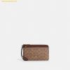 Ví Dài Coach Double Zip Wallet In Signature Canvas CX161 Nâu Logo