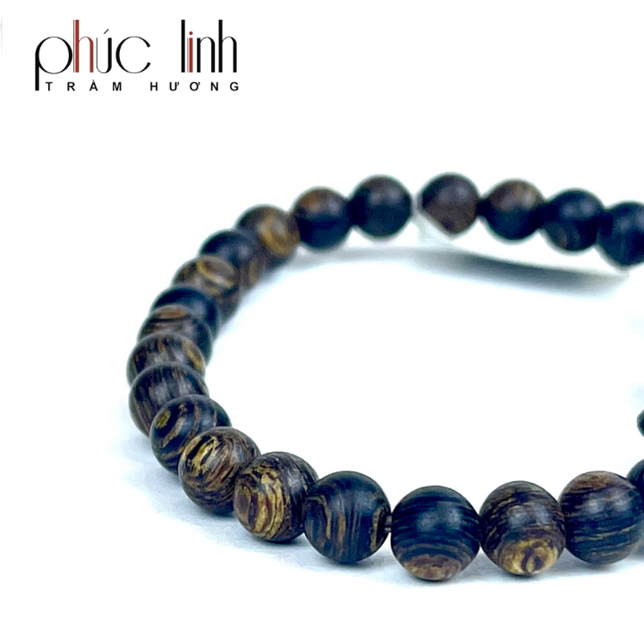Vòng Tay Phúc Linh Sánh Quằn 6ly Phối Charm Trầm Hồ Ly