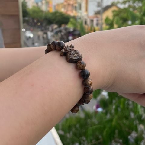 Vòng Tay Phúc Linh Sánh Quằn 8ly Phối Charm Sánh Thần Tài