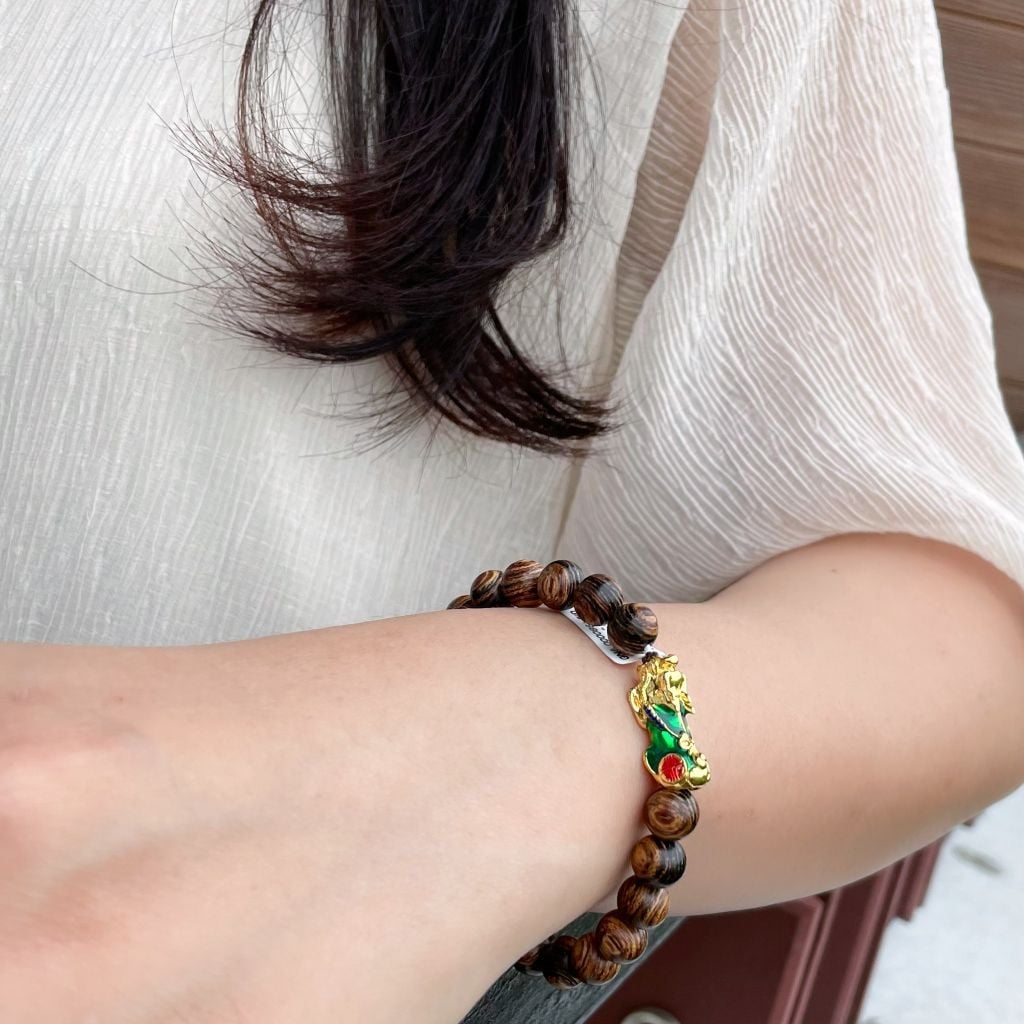 Vòng Tay Phúc Linh Sánh Quằn 8ly Phối Tỳ Hưu Kim Mã