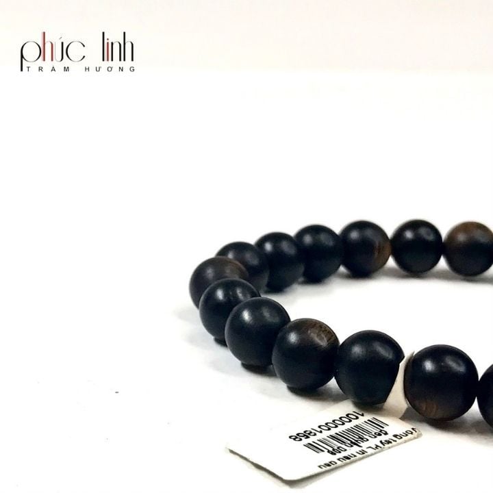 Vòng Tay Trầm Indo Ép Dầu Đen Mix Charm Bạc 8ly