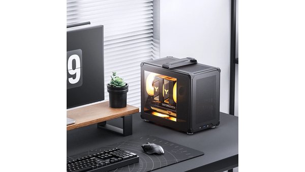 Vỏ case Jonsbo C6 Max Black đặt trên bàn làm việc
