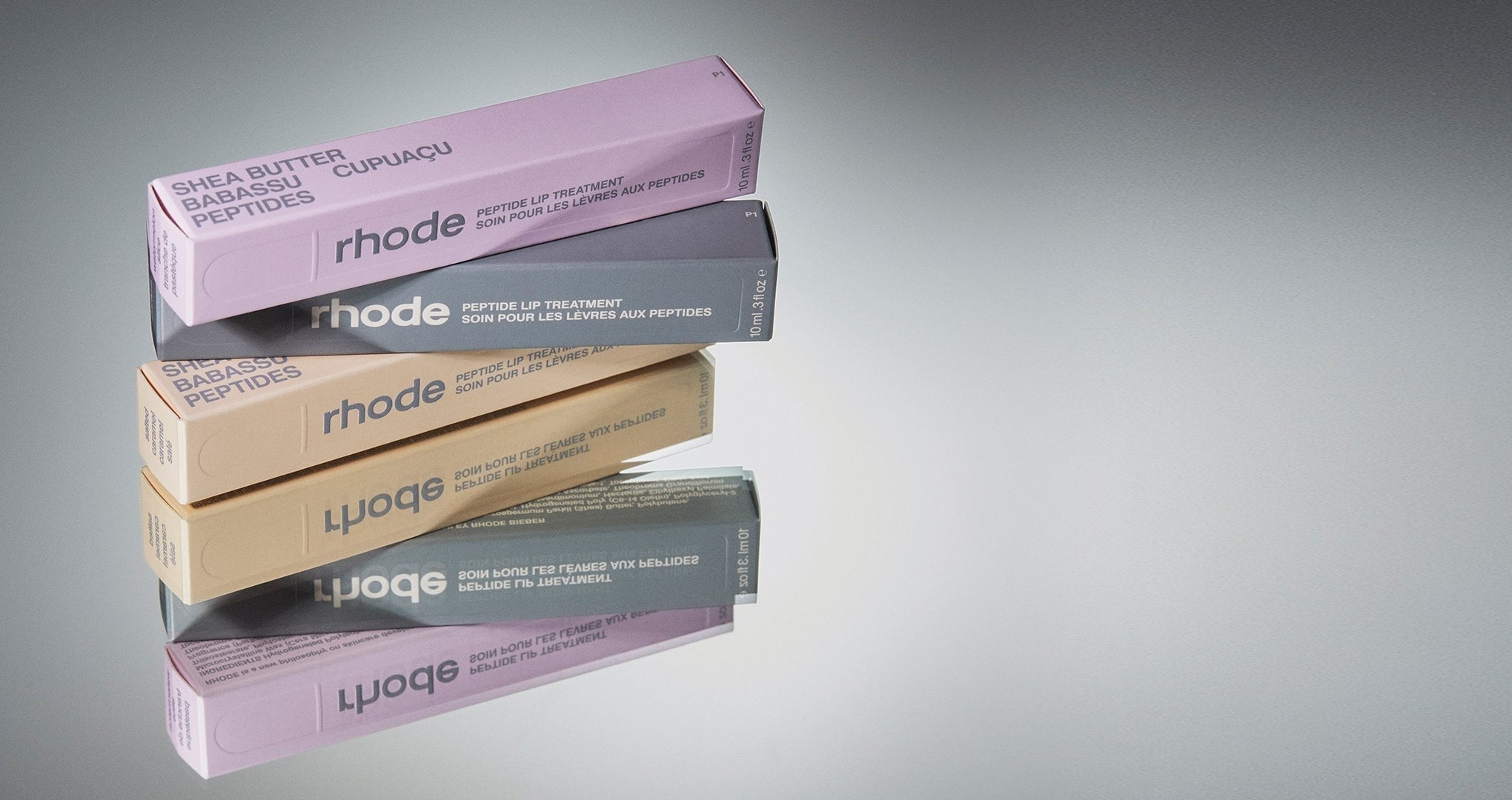 peptide lip treatment boxes, from top to bottom: watermelon slice, unscented, salted caramel
